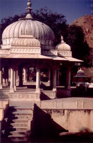 Gaitor is about 15 kilometers from Jaipur and is famous for the cenotaphs or chhatris of Jaipur rulers, with the exception of Sawai Ishwari Singhs. The cenotaph of Sawai jai Singh II stands out for its delicate carvings and beautiful shape. The cenotaphs of all Jaipur rulers, with the exception of Sawai Ishwari Singh who was cremated outside the Jai Niwas Garden were built at this place. All the chattris are covered with bas-relief depicting the tastes of the person it commemorates. There are memorials to the queens in the Maharani-ki-Chhatri complex near the Ramgarh road crossing. The white marble cenotaph of Maharajah Jai Singh II is the most impressive which is decorated with carved peacocks. 
